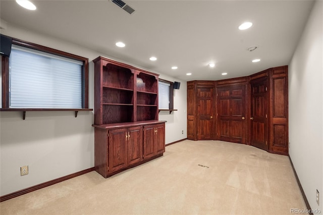 interior space with light colored carpet