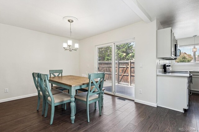 10309 W Fair Ave Unit E, Littleton, CO 80127 - dining room with a chandelier, dark wood finished floors, baseboards, and beamed ceiling