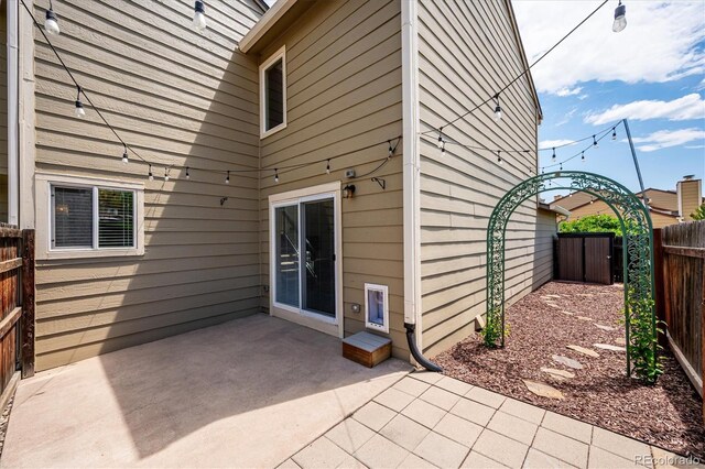 10309 W Fair Ave Unit E, Littleton, CO 80127 - view of patio / terrace featuring a gate