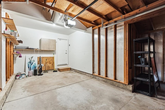 10309 W Fair Ave Unit E, Littleton, CO 80127 - garage featuring a garage door opener