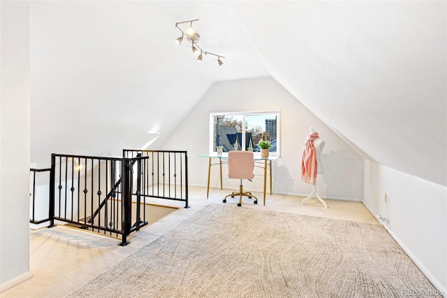 bonus room featuring carpet floors, baseboards, and vaulted ceiling