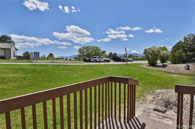 5501 Denmark Ct, Colorado Springs, CO 80918 - deck with a mountain view and a yard