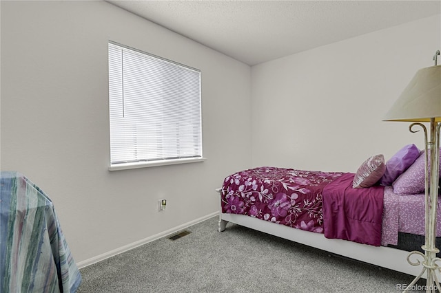 5501 Denmark Ct, Colorado Springs, CO 80918 - carpeted bedroom with baseboards
