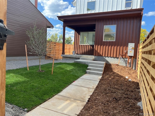 exterior space featuring a lawn