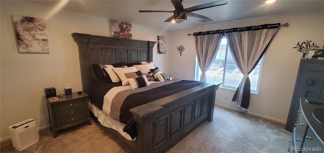 bedroom with carpet flooring, a ceiling fan, and baseboards