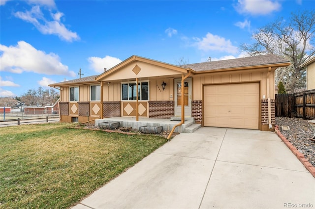 6545 Union St, Arvada, CO 80004 - ranch-style home featuring covered porch, fence, an attached garage, and board and batten siding