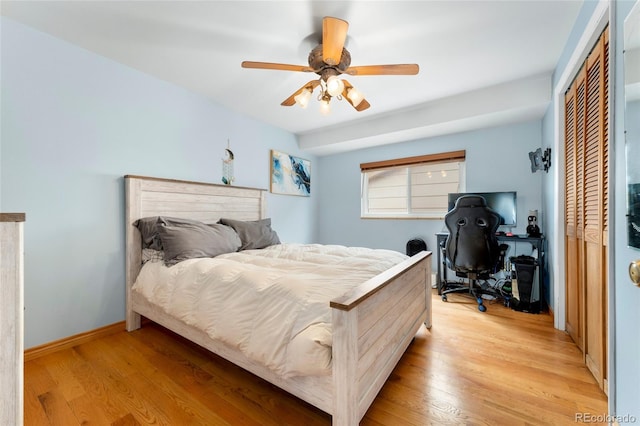 6545 Union St, Arvada, CO 80004 - bedroom with baseboards, light wood-style floors, ceiling fan, and a closet