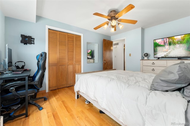 6545 Union St, Arvada, CO 80004 - bedroom with visible vents, light wood finished floors, ceiling fan, and a closet