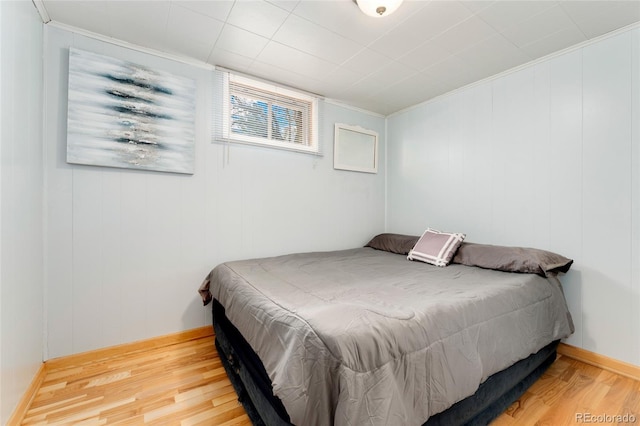6545 Union St, Arvada, CO 80004 - bedroom featuring ornamental molding and wood finished floors