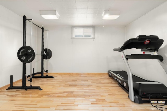 6545 Union St, Arvada, CO 80004 - workout area featuring baseboards and wood finished floors