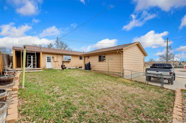 6545 Union St, Arvada, CO 80004 - back of house with a yard and fence