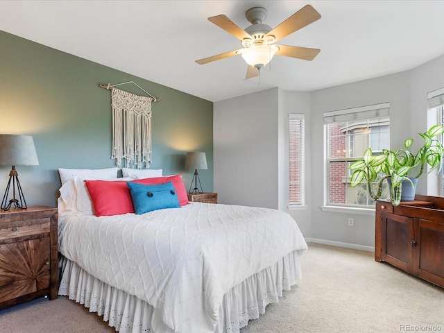 8450 E 29th Ave, Denver, CO 80238 - carpeted bedroom with baseboards and a ceiling fan