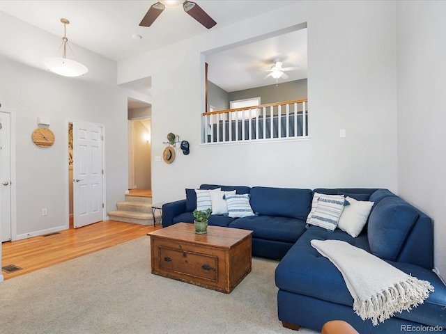 8450 E 29th Ave, Denver, CO 80238 - living room featuring a ceiling fan, stairway, and wood finished floors