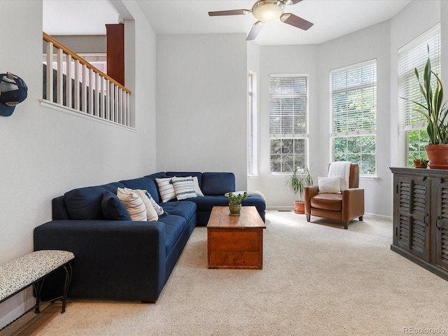 8450 E 29th Ave, Denver, CO 80238 - living room featuring ceiling fan and carpet