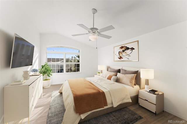 bedroom featuring ceiling fan, vaulted ceiling, and light hardwood / wood-style flooring