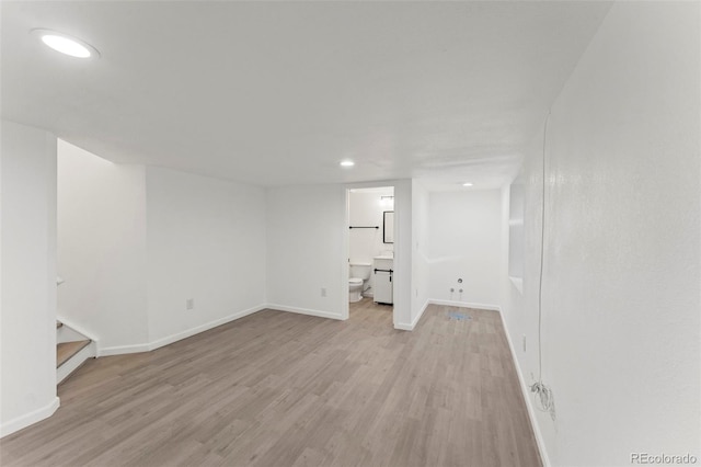 basement with light wood-type flooring