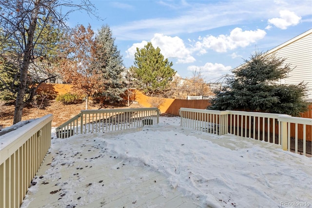 view of snow covered deck