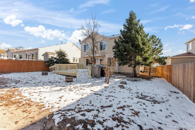 view of snow covered property