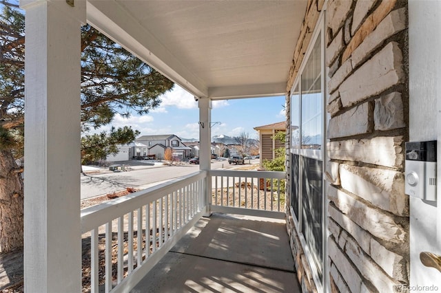 balcony featuring a porch