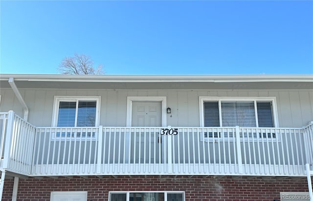 doorway to property with a porch