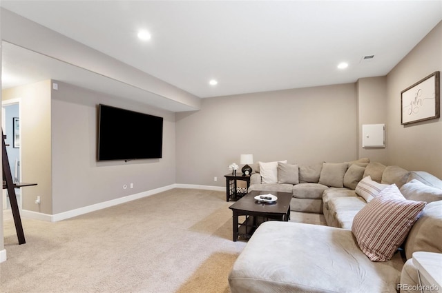 living area with light colored carpet, baseboards, and recessed lighting