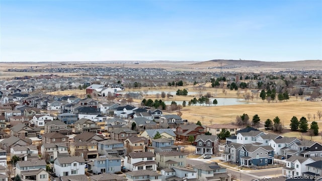 drone / aerial view of a water and mountain view