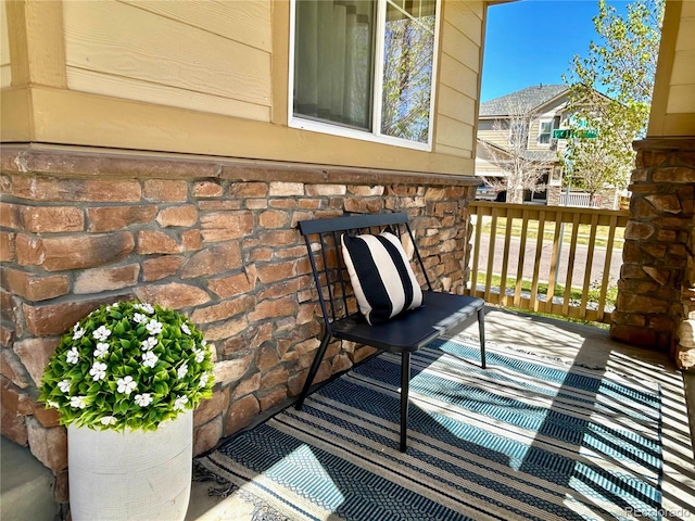 balcony featuring a porch