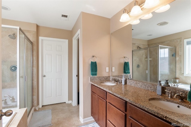 10995 Quintero St, Commerce City, CO 80022 - full bathroom featuring a stall shower, a garden tub, and double vanity
