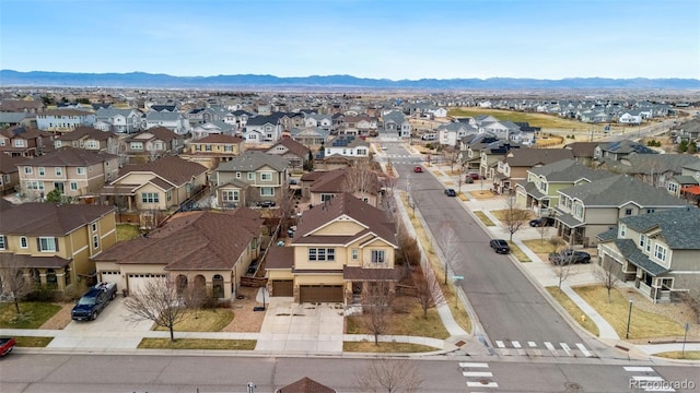10995 Quintero St, Commerce City, CO 80022 - aerial perspective of suburban area featuring a mountainous background