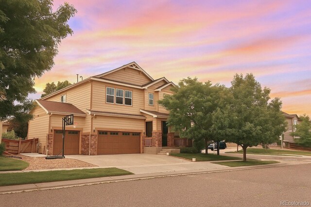 10995 Quintero St, Commerce City, CO 80022 - craftsman-style home featuring an attached garage and concrete driveway