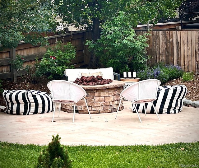 10995 Quintero St, Commerce City, CO 80022 - view of patio with a fire pit