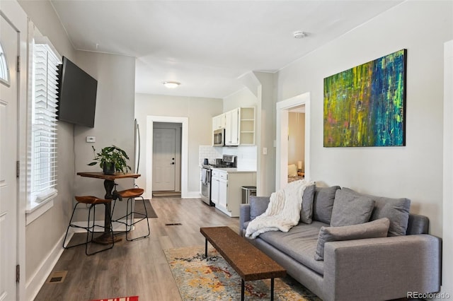 1456 Syracuse St, Denver, CO 80220 - living room with wood finished floors and baseboards