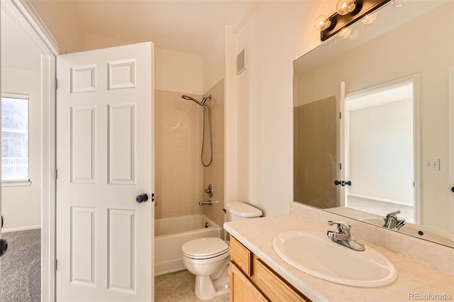 bathroom featuring vanity, toilet, and bathtub / shower combination