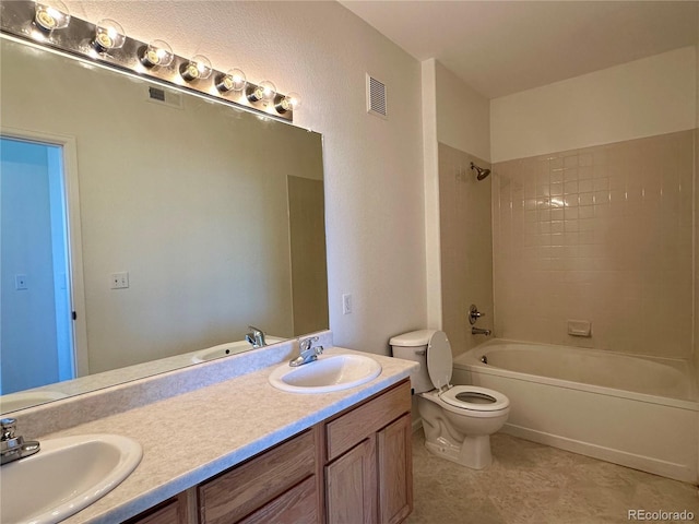 full bath with toilet, double vanity, and shower / bathtub combination