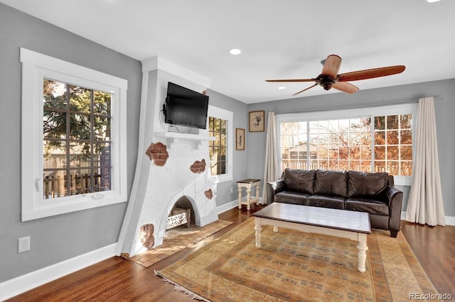 5725 W Mississippi Ave, Lakewood, CO 80226 - living room with baseboards, a ceiling fan, wood finished floors, healthy amount of natural light, and recessed lighting