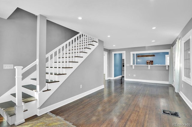 5725 W Mississippi Ave, Lakewood, CO 80226 - stairs with wood finished floors, recessed lighting, and baseboards