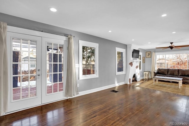 5725 W Mississippi Ave, Lakewood, CO 80226 - living area with french doors, baseboards, wood finished floors, a ceiling fan, and recessed lighting