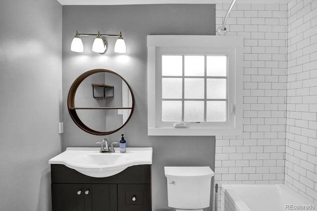 5725 W Mississippi Ave, Lakewood, CO 80226 - full bathroom featuring toilet and vanity