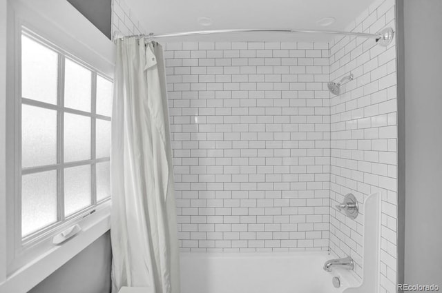 5725 W Mississippi Ave, Lakewood, CO 80226 - full bathroom featuring shower / tub combo with curtain and healthy amount of natural light