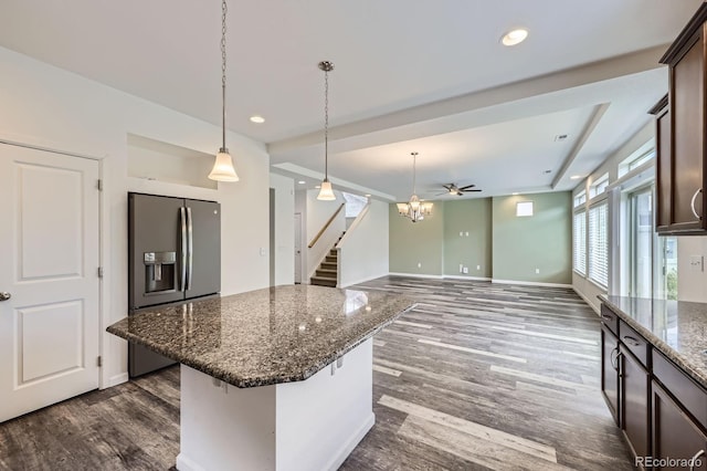 133 Poppy View Ln, Erie, CO 80516 - kitchen with stainless steel fridge with ice dispenser, dark brown cabinets, dark wood-type flooring, hanging light fixtures, and recessed lighting
