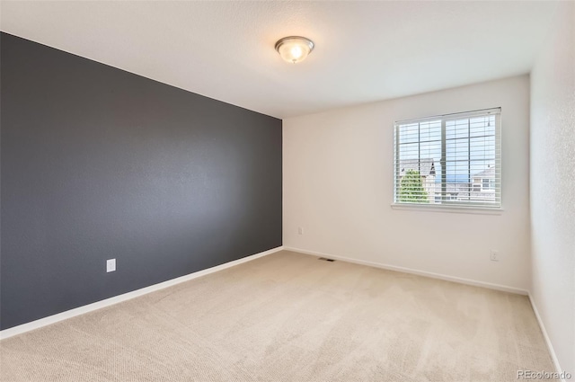 133 Poppy View Ln, Erie, CO 80516 - empty room with light carpet and baseboards