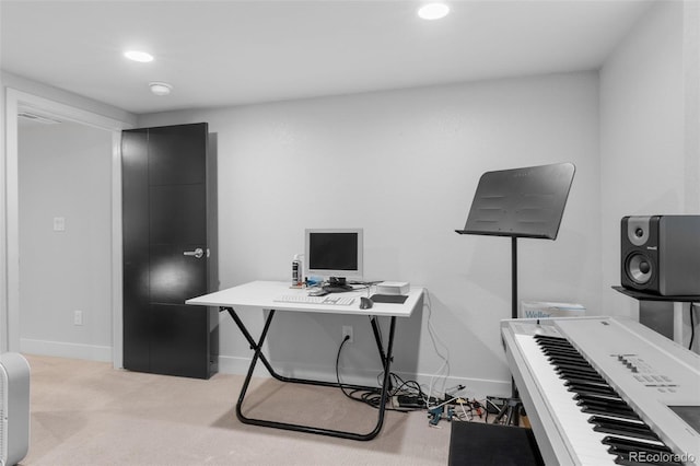 carpeted office space with baseboards and recessed lighting