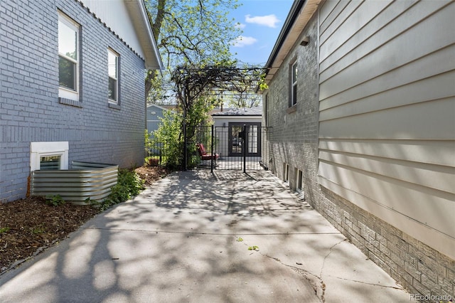 view of patio featuring fence