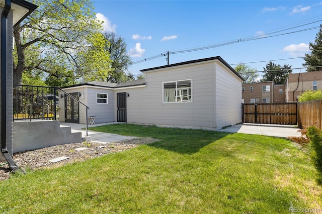 rear view of house with a patio area