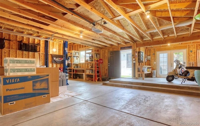 misc room featuring concrete flooring and french doors