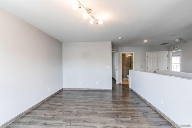 3607 Dinosaur St, Castle Rock, CO 80109 - spare room featuring wood finished floors, baseboards, and recessed lighting