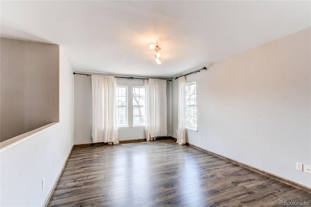 3607 Dinosaur St, Castle Rock, CO 80109 - unfurnished room featuring dark wood-style flooring and baseboards