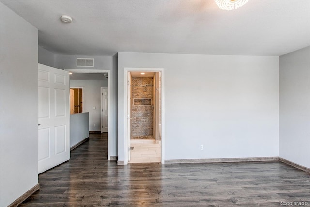 3607 Dinosaur St, Castle Rock, CO 80109 - unfurnished bedroom featuring wood finished floors, baseboards, and ensuite bath