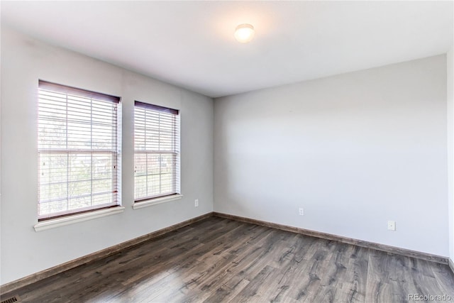 3607 Dinosaur St, Castle Rock, CO 80109 - empty room with dark wood-type flooring and baseboards