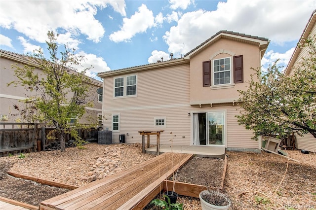 3607 Dinosaur St, Castle Rock, CO 80109 - rear view of property with fence, central air condition unit, and a patio